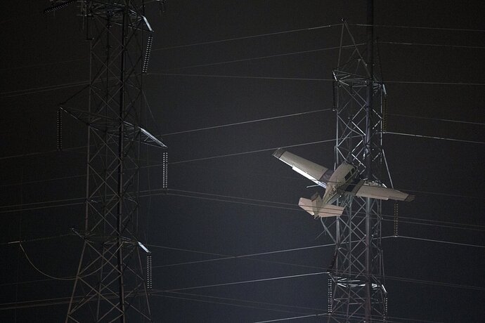 Small plane crashes into transmission line