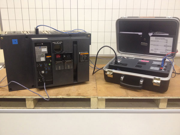 Secondary-injection manufacturers test kit connected to circuit breaker