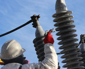 Cleaning high voltage insulators
